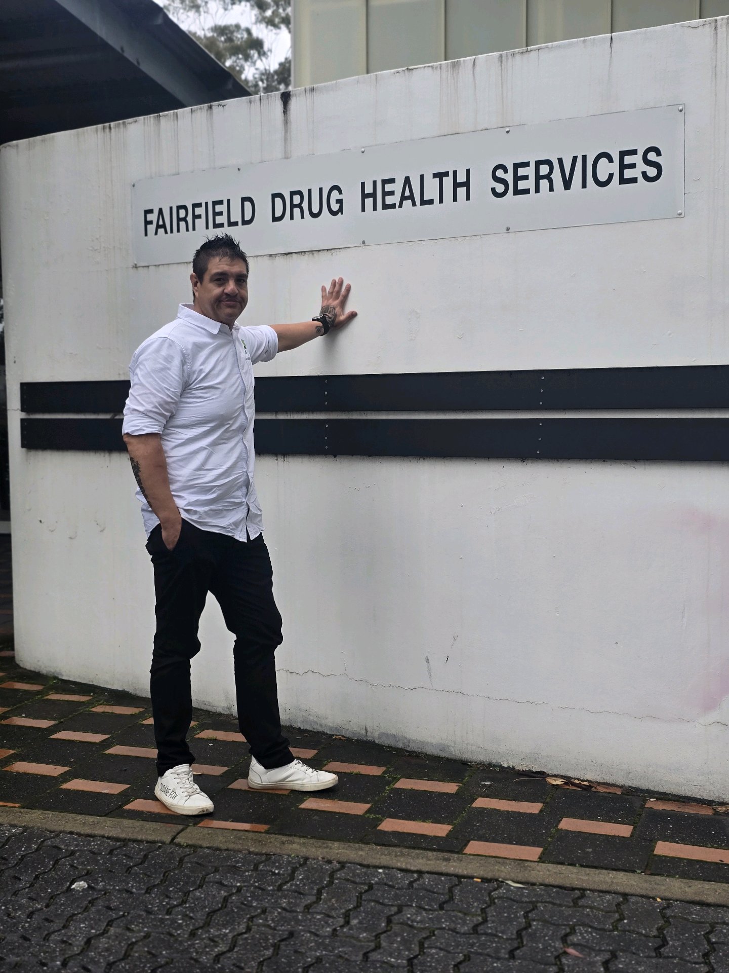 Juan standing outside Fairfield Drug Health Services